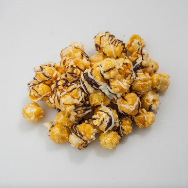Chocolate drizzled Caramel Popcorn available at Whitehousepopcorn.com